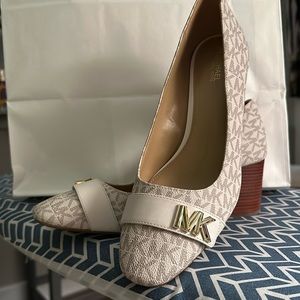 White Michael Kors with block heel.